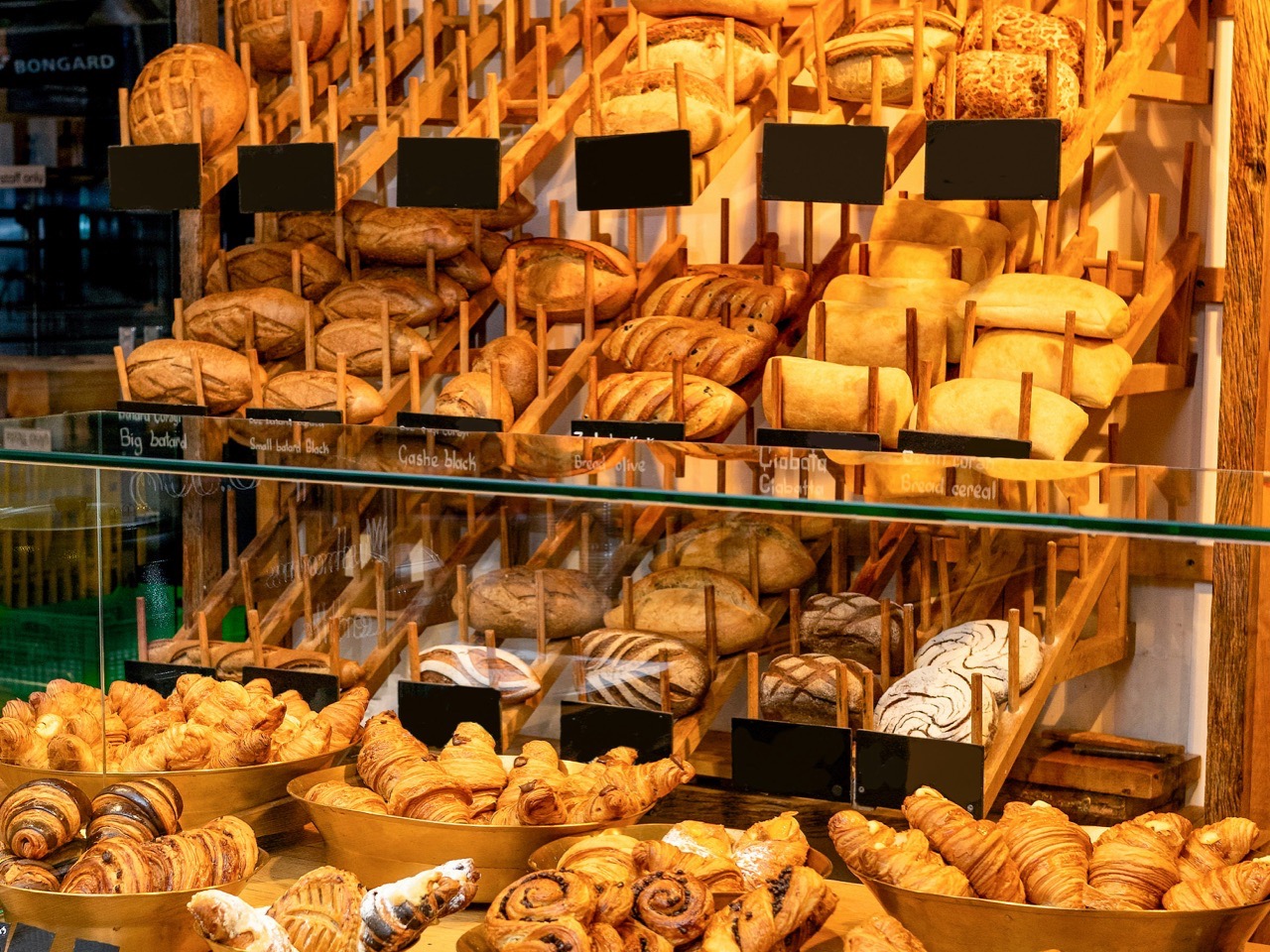 Bakery display case fully restocked